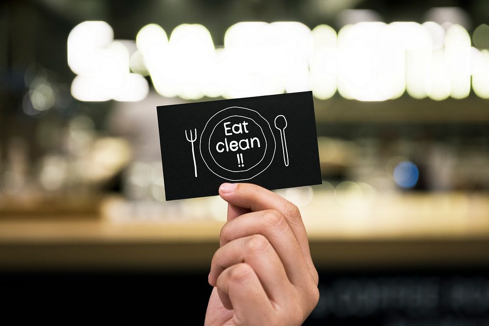 Eat clean phrase written on a card