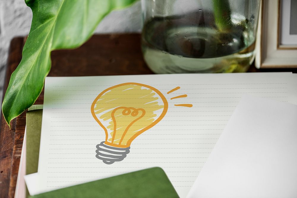 Light bulb drawn on a paper