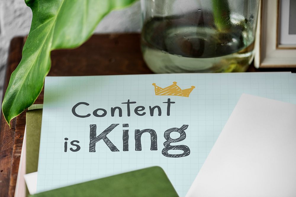Content is king written on a paper