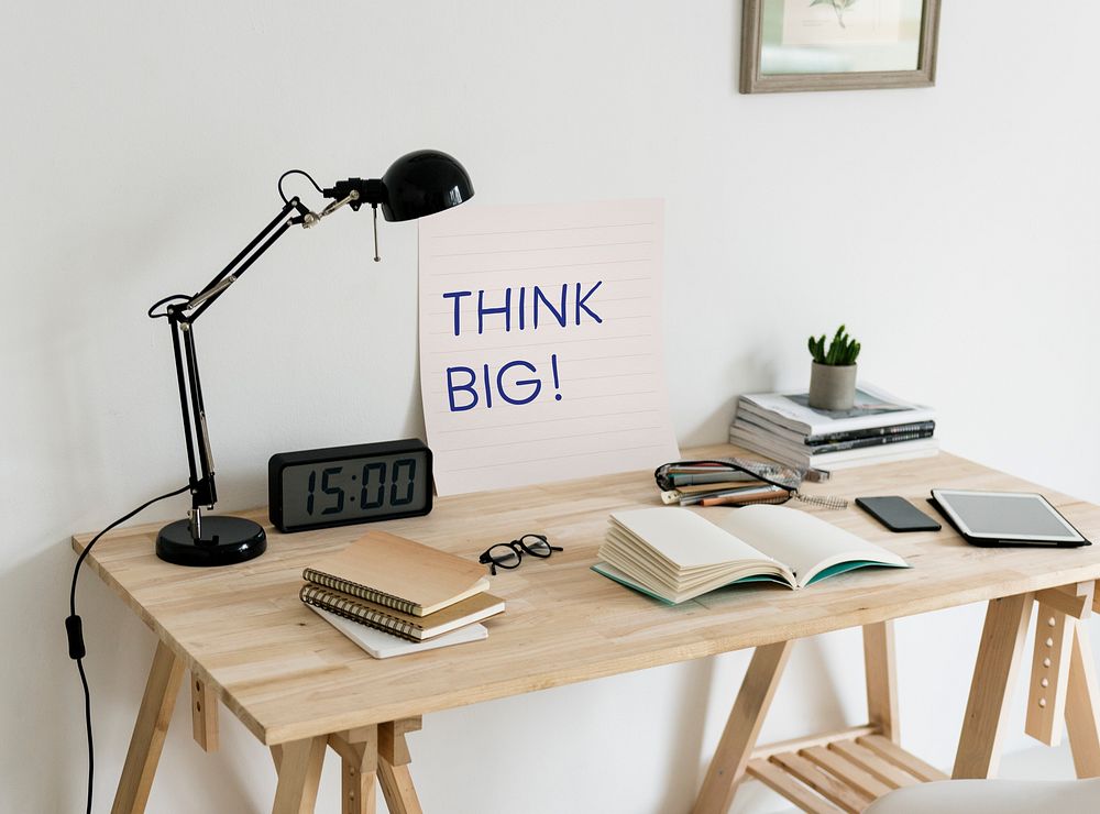 Minimal style workspace with a phrase Think big