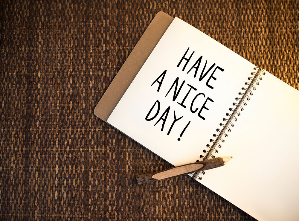Have a nice day written on a notebook