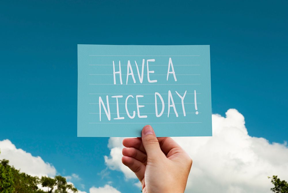 Have a nice day phrase written on a card