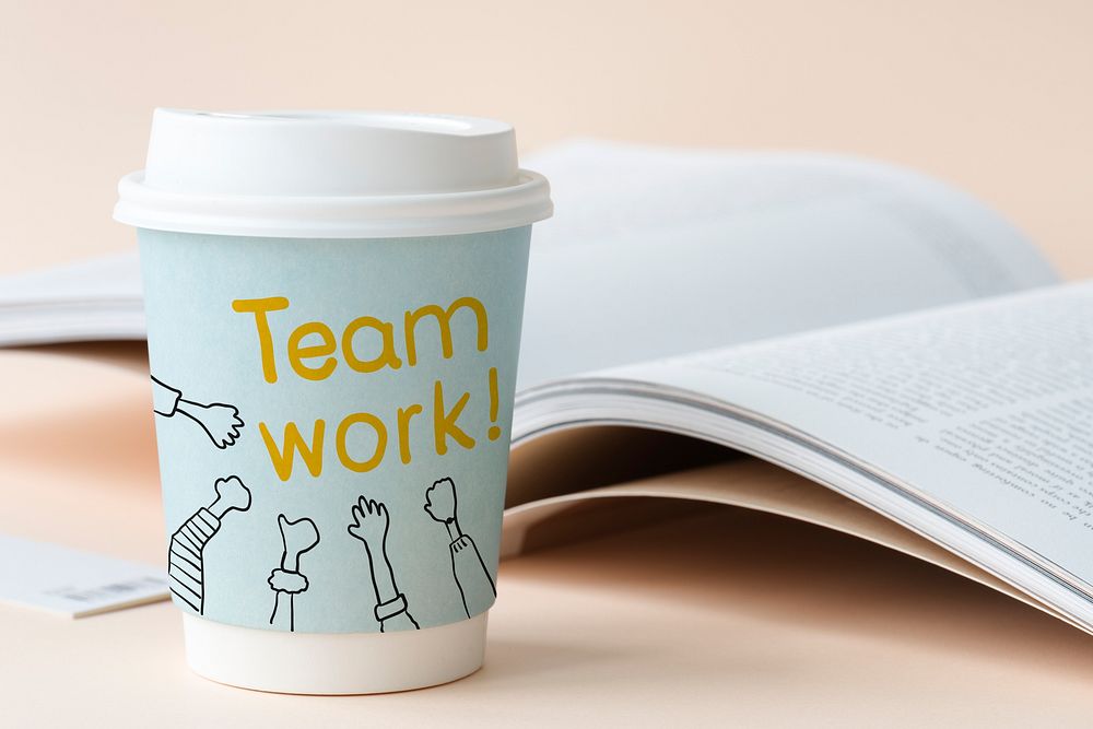 Teamwork written on a paper cup