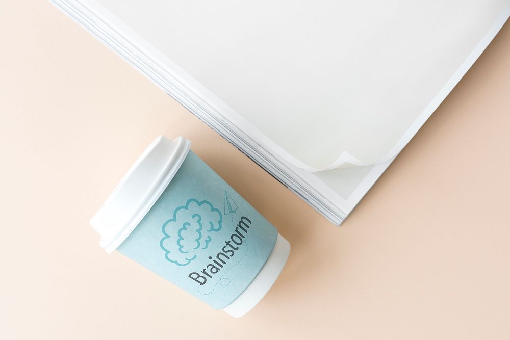 Brainstorm written on a paper cup