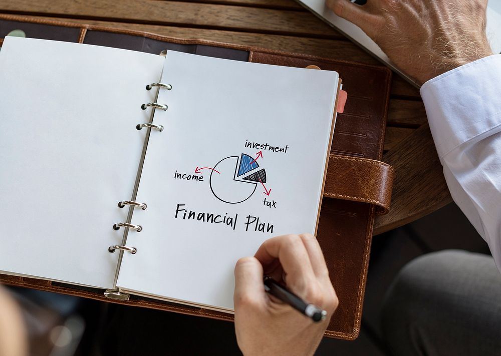 Financial plan on a notebook