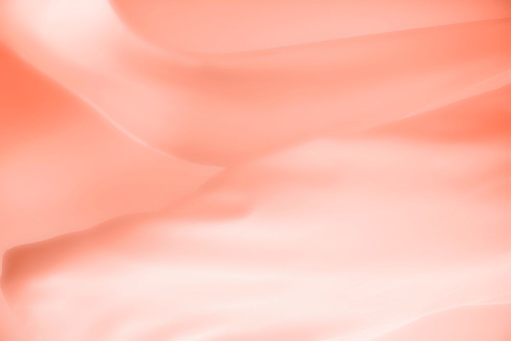 Peach satin cloth texture background 