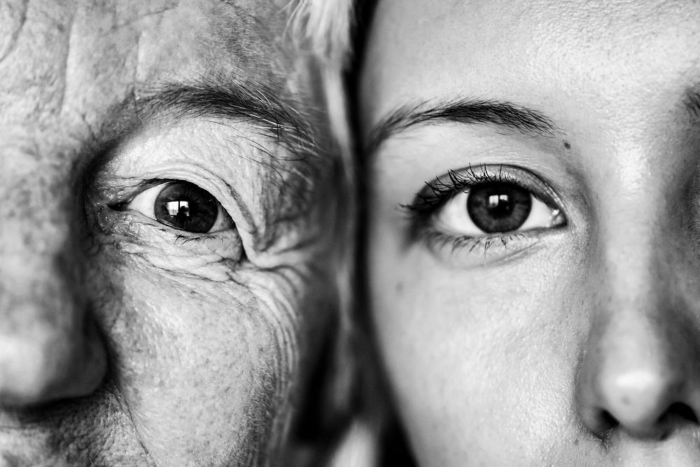 Gray scale wallpaper background, eyes of old woman and young woman