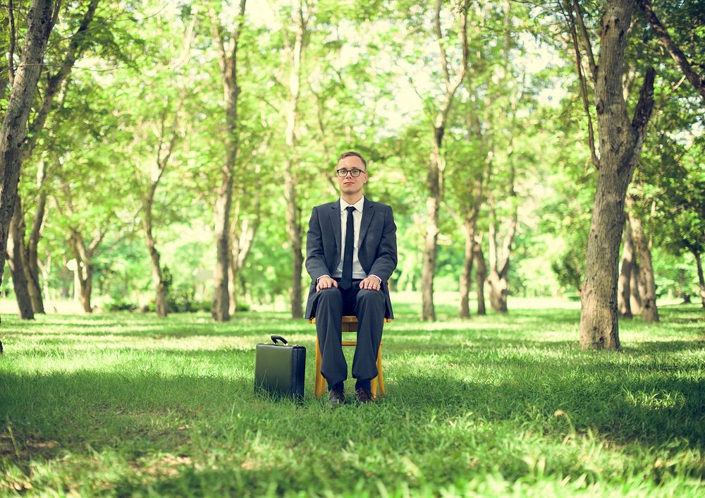 Green Businessman Environmental Conservation Businessman Sitting Concept