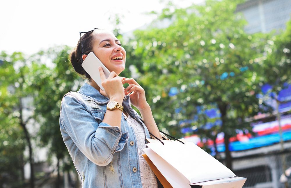 Woman Shopping Outdoor Talking Mobile Phone Concept