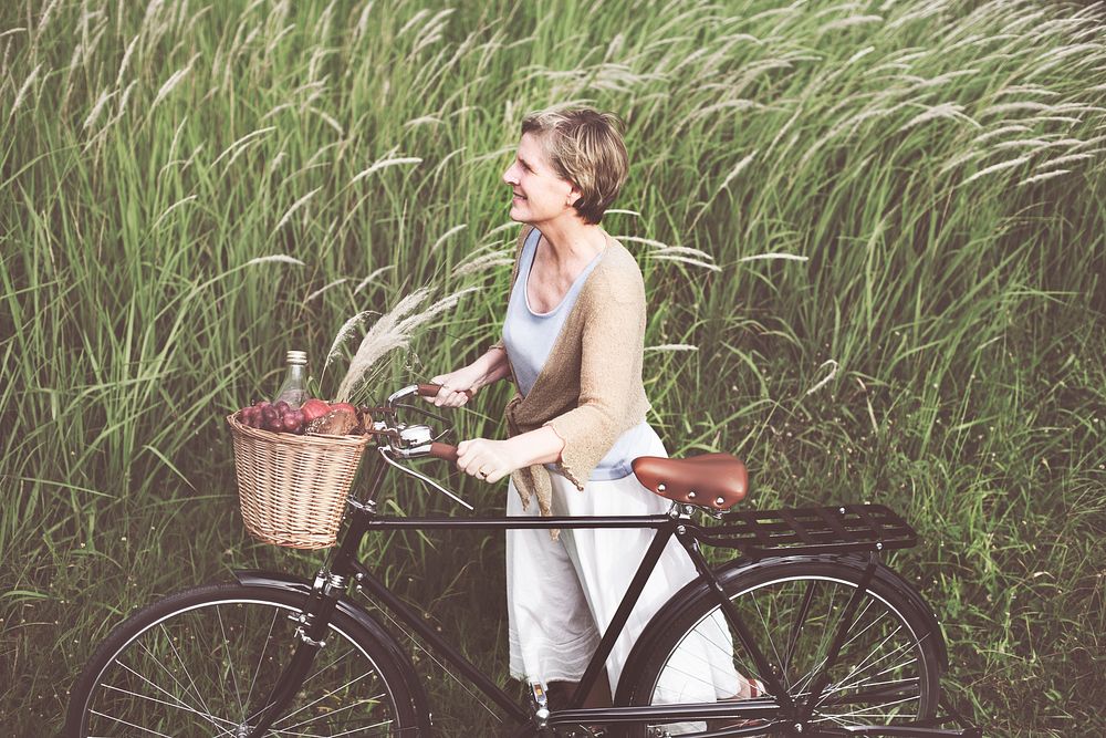 Woman Senior Bicycle Carefree Freshness Peaceful Concept