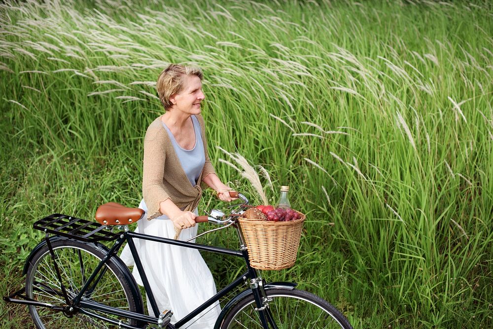 Mature woman with a bicycle