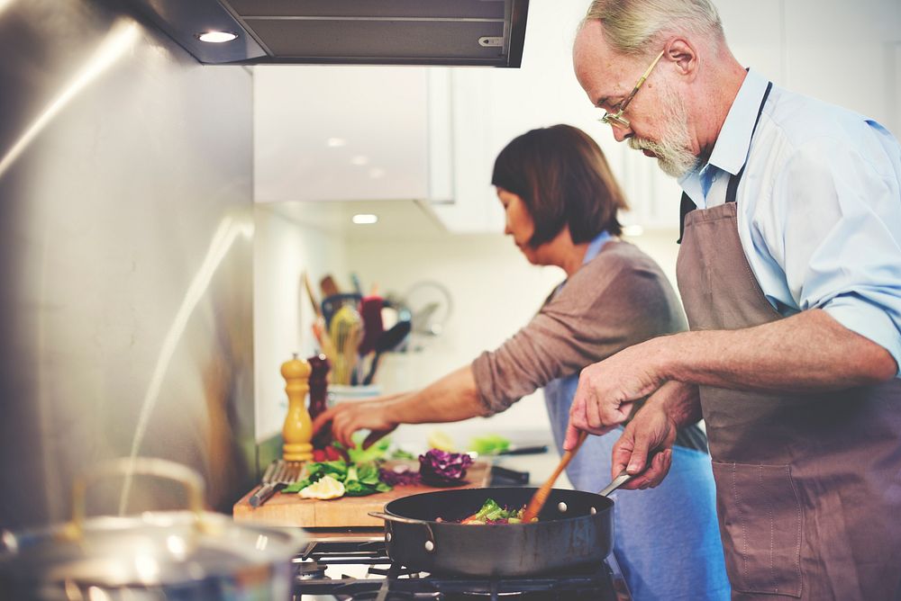 Couple Helping Cooking Preparation Concept