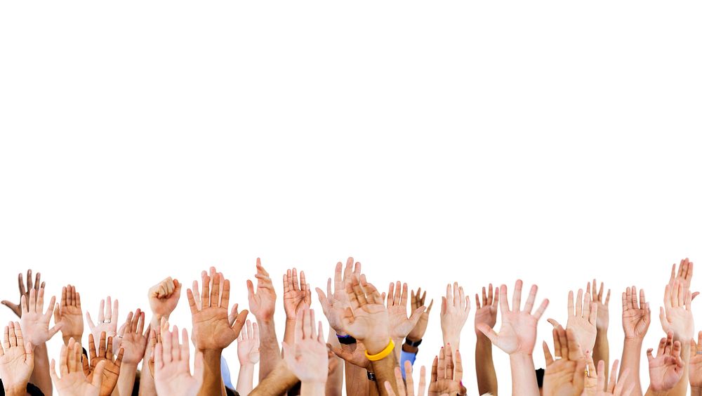 Multi ethnic people's hands raised.