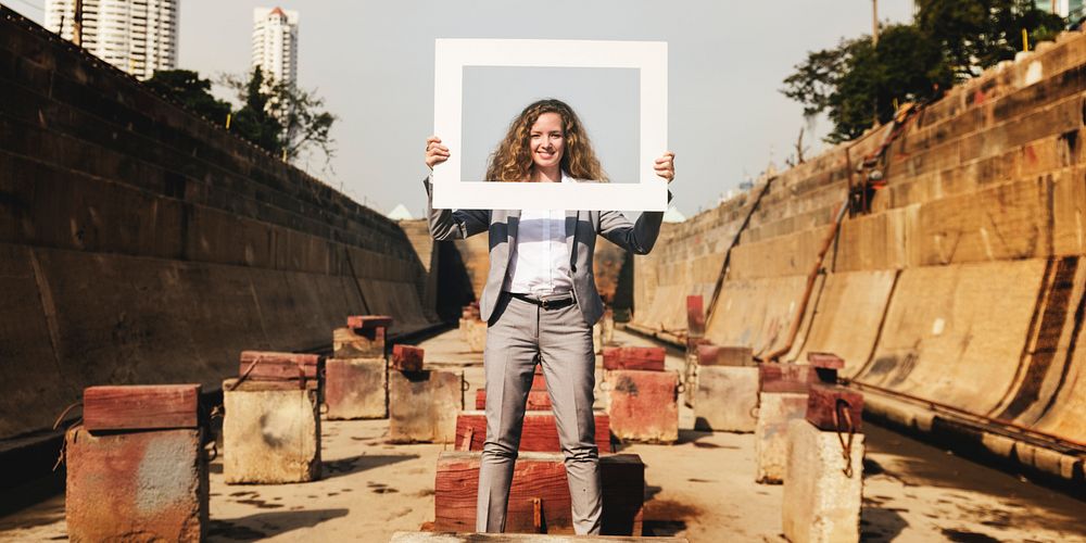 Businesswoman Picture Frame Holding Concept