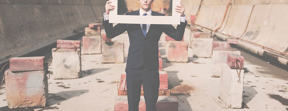Businessman Picture Frame Holding Concept