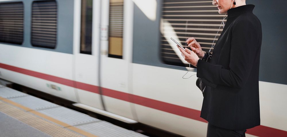 Woman waiting for a train on the platform