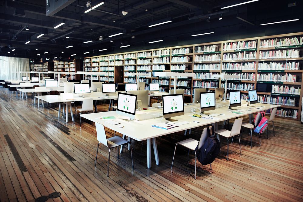 Modern library with computers for students Premium Photo rawpixel