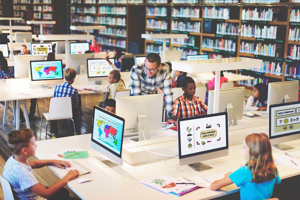 young-students-using-computers-in-class-premium-photo-rawpixel