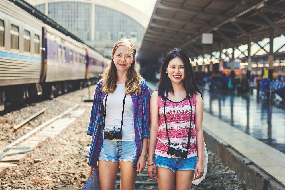 Young tourists at train station