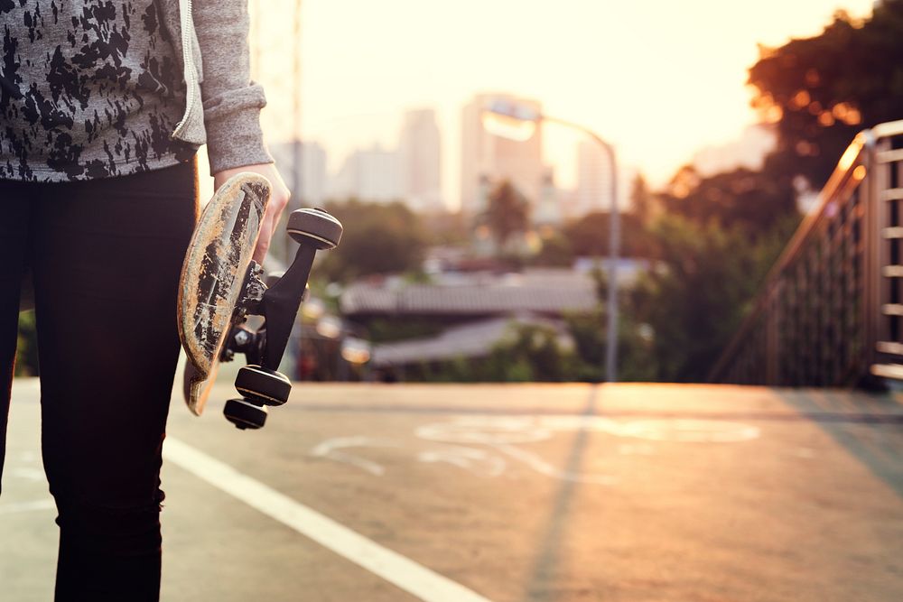 Skater Boy Holding Skateboard Outdoors Concept
