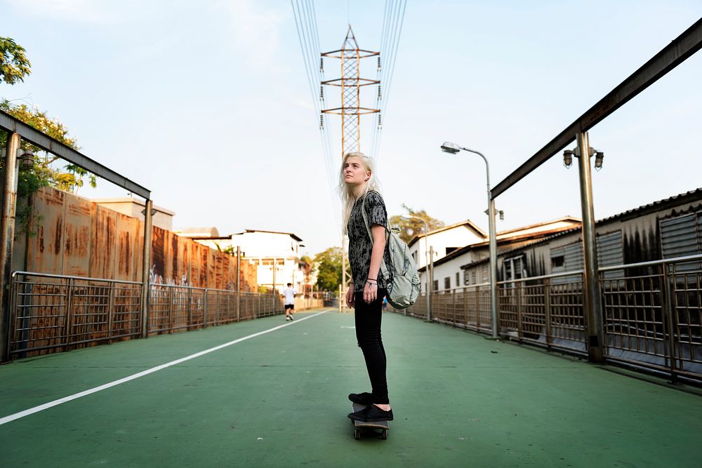 Young Girl Skateboad Outdoors Urban Concept