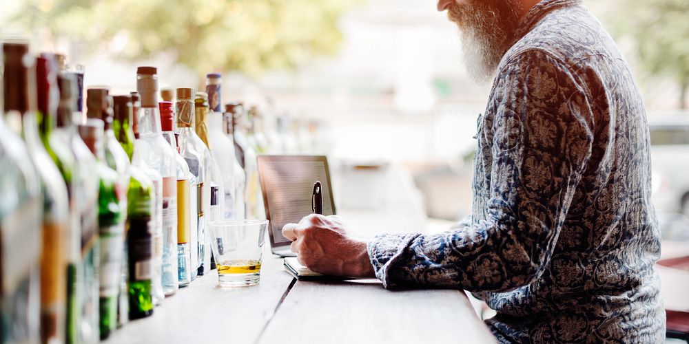Senior Man Writing Working Liquor Alchohol Bar Concept