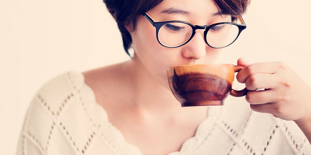 Asian Girl Drinking Tea Beverage Refreshment Relaxation Concept