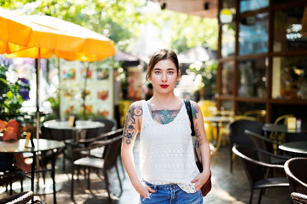 Pretty Tattooed Girl Cafe Relaxation Concept