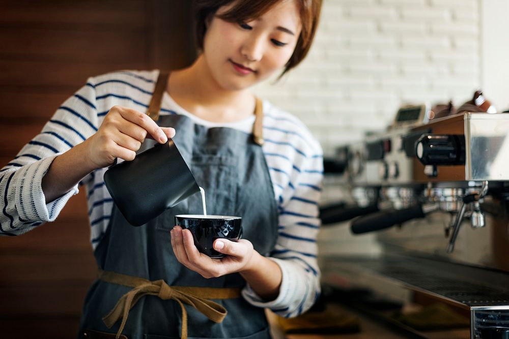 Barista is making coffee