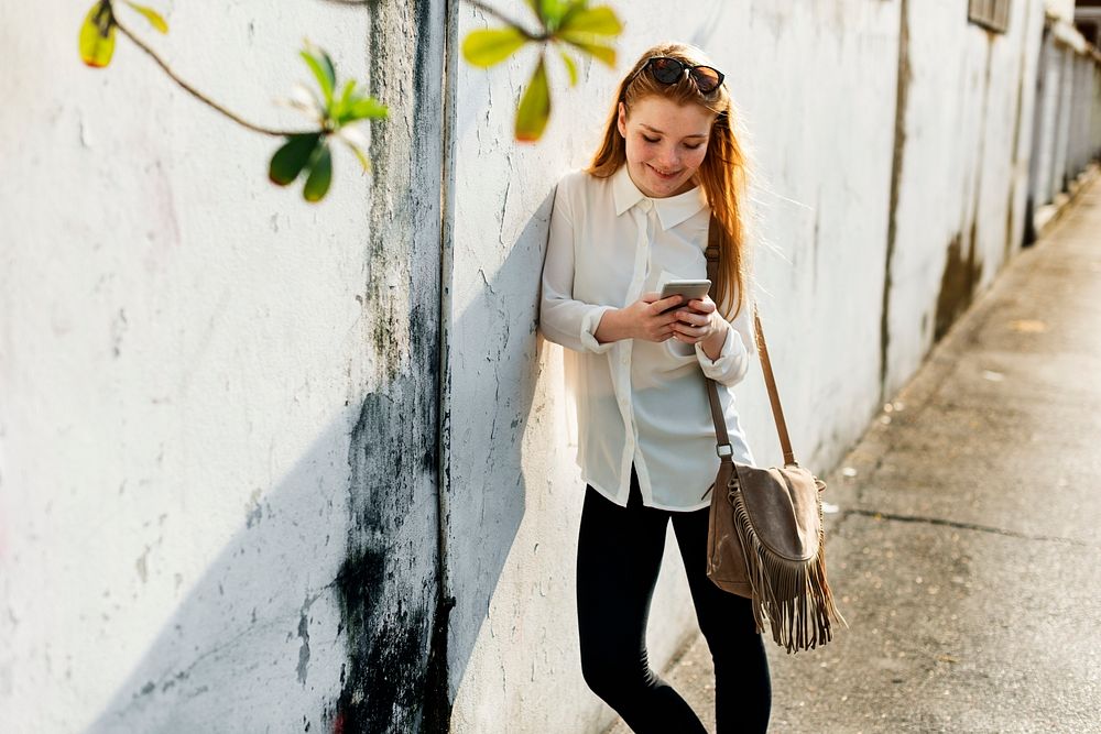 Girl Using Browsing Phone Concept