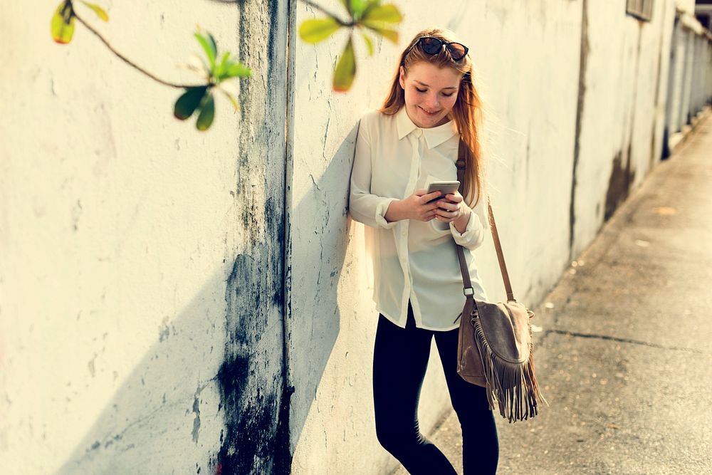 Girl Using Browsing Phone Concept