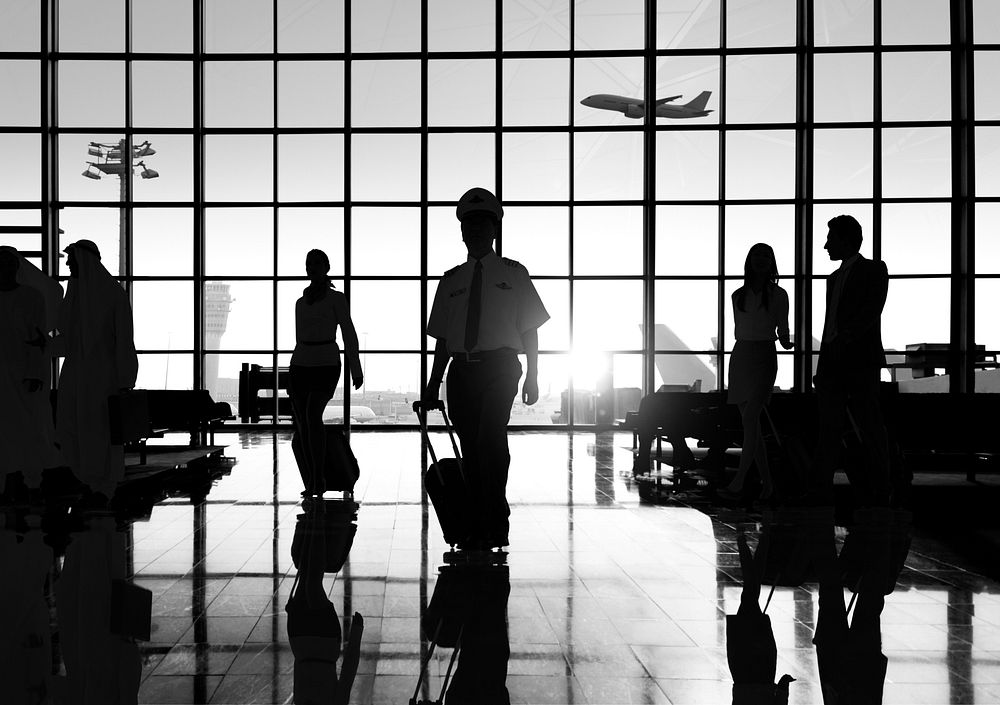 Back Lit Business People Traveling Airport Concept
