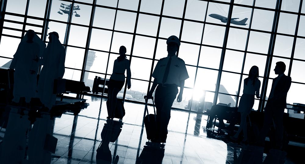 Back Lit Business People Traveling Airport Concept