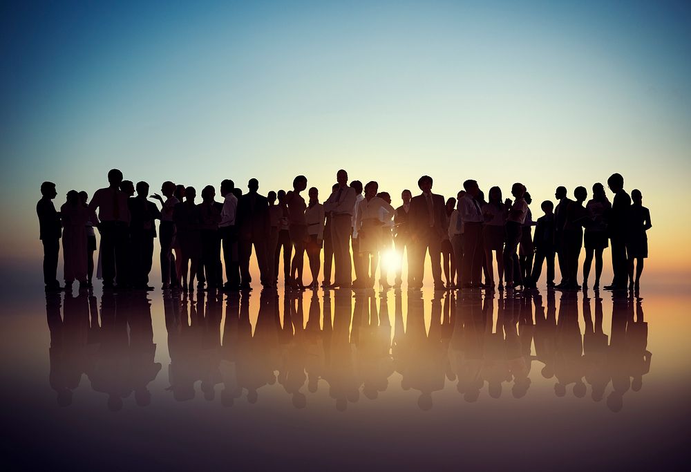 Silhouettes of Business People Gathering Outdoors