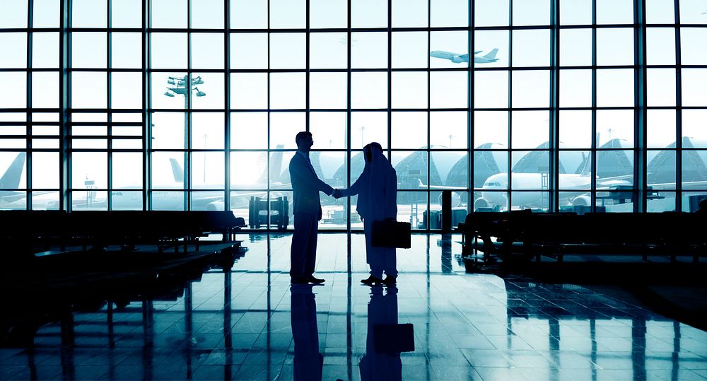 Businessmen Handshake Deal Partnership International Airport Concept