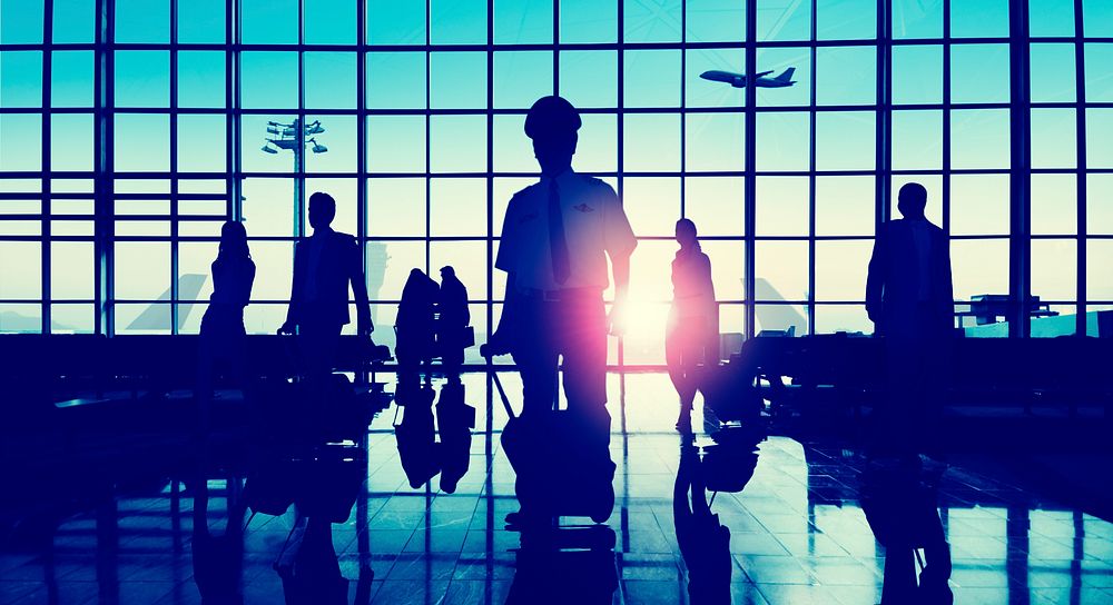 Back Lit Business People Traveling Airplane Airport Concept