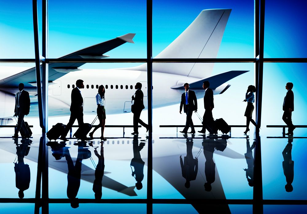 Multiethnic Group of Business People with Airplane Concept