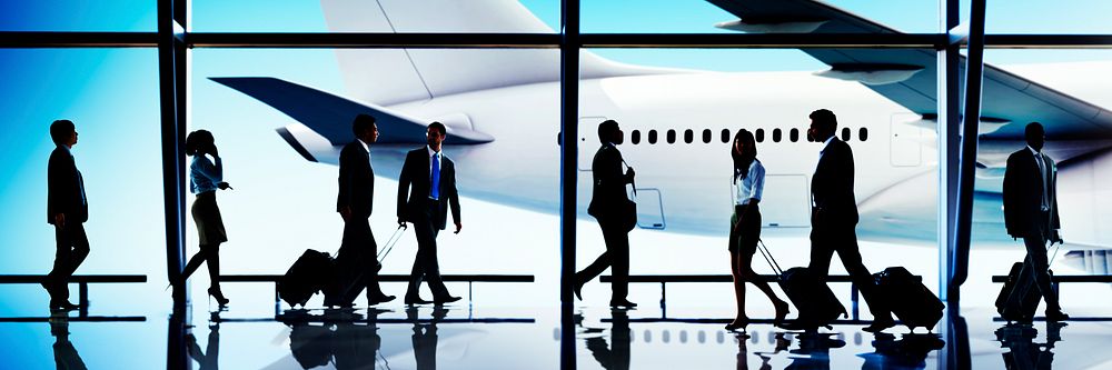 Multiethnic Group of Business People with Airplane Concept
