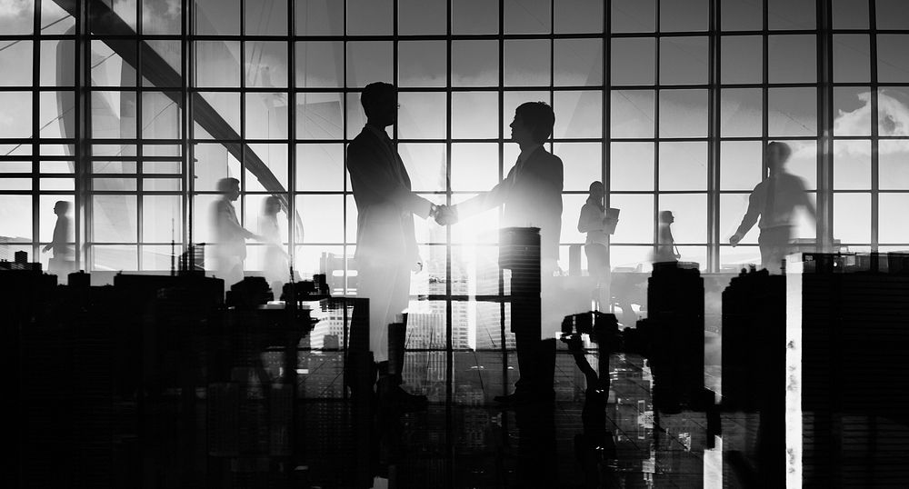 Abstract silhouette of business people and the city