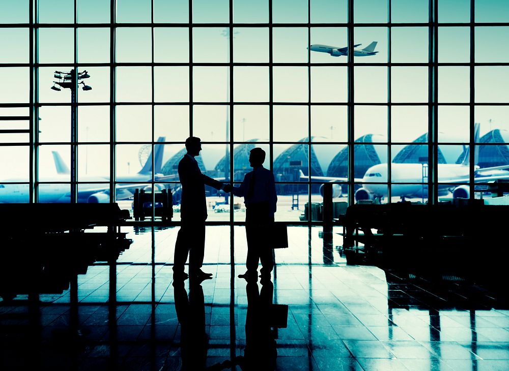 International Airport Business Travel Airport Handshake Concept