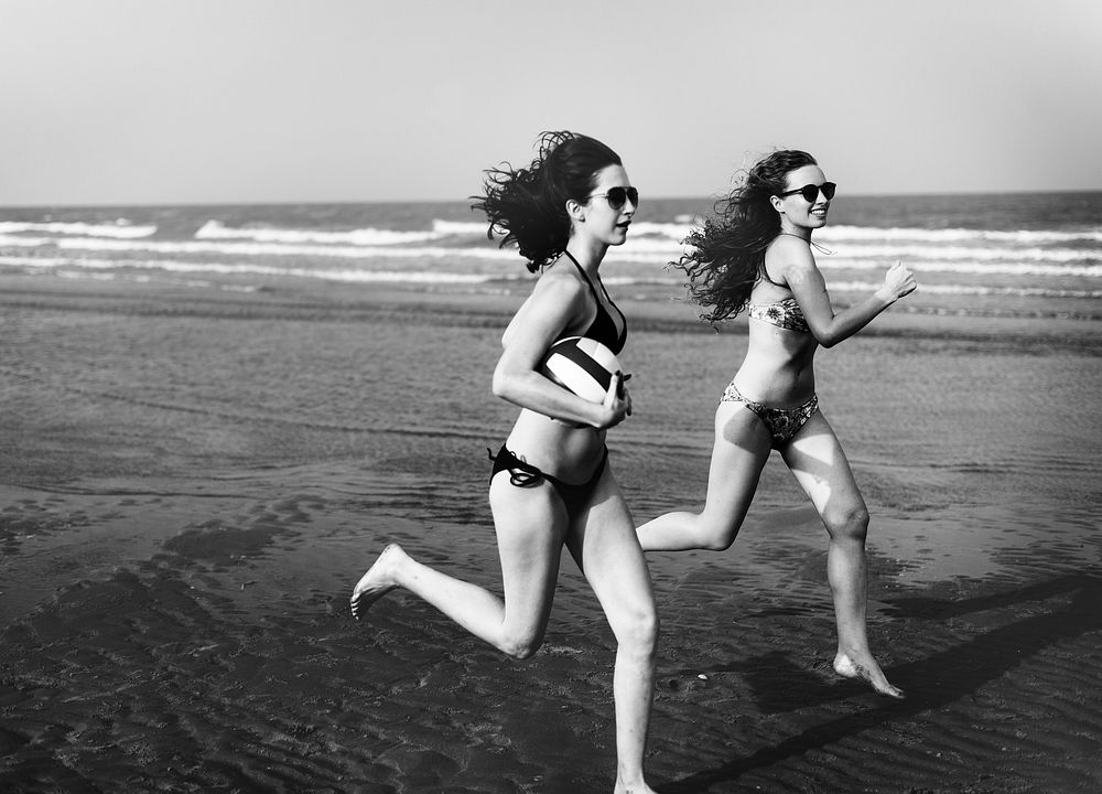 Two Women Play Beach Concept