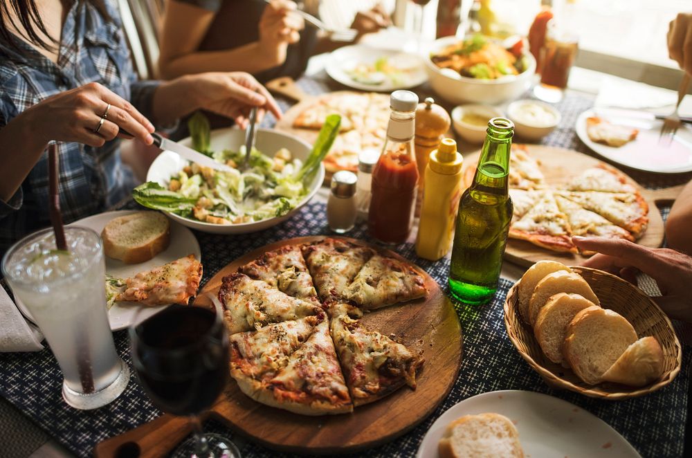 Friends Eating Pizza Party Together Concept