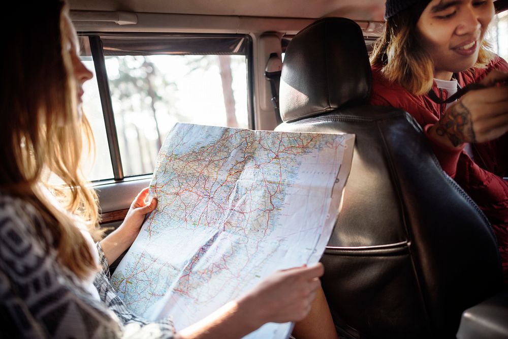 Friends checking the map for directions