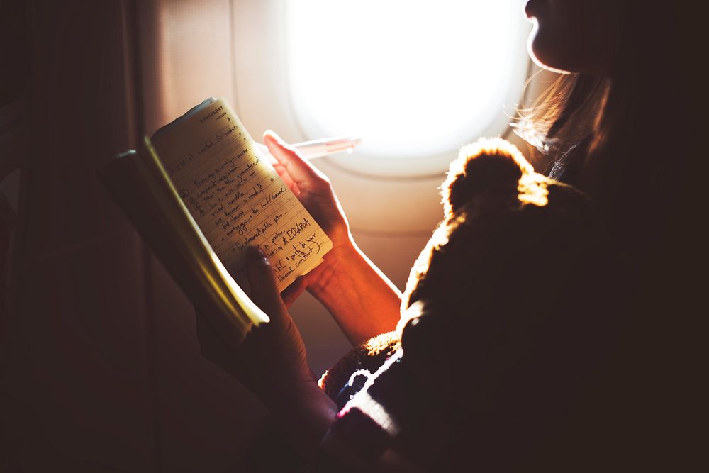 A girl traveling by airplane