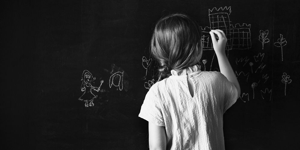 Girl Drawing Blackboard Chalk Concept
