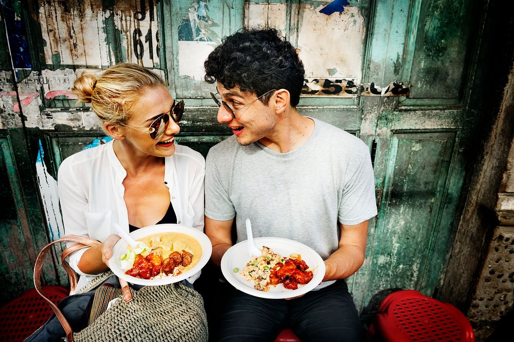 Caucasian couple with Asian food