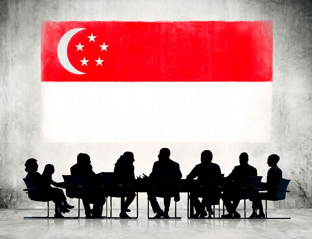 Group of Corporate People Having a Meeting Regarding the National Issues of Singapore