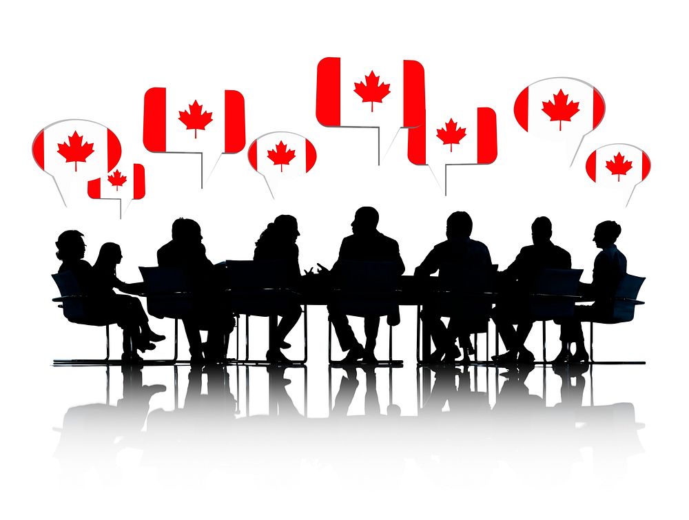 Talking Business People Silhouettes Isolated On White With Canadian Flag Speech Bubble