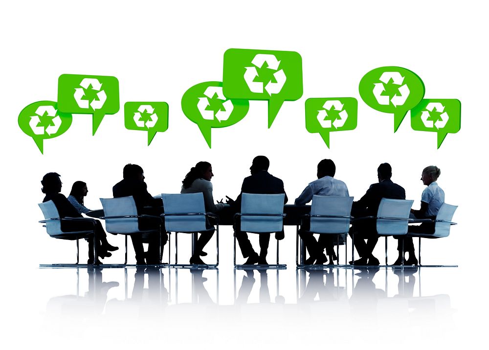Silhouette of people in a meeting talking about recycling