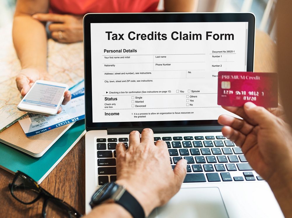 Tax Credits Claim Return Deduction Refund Concept